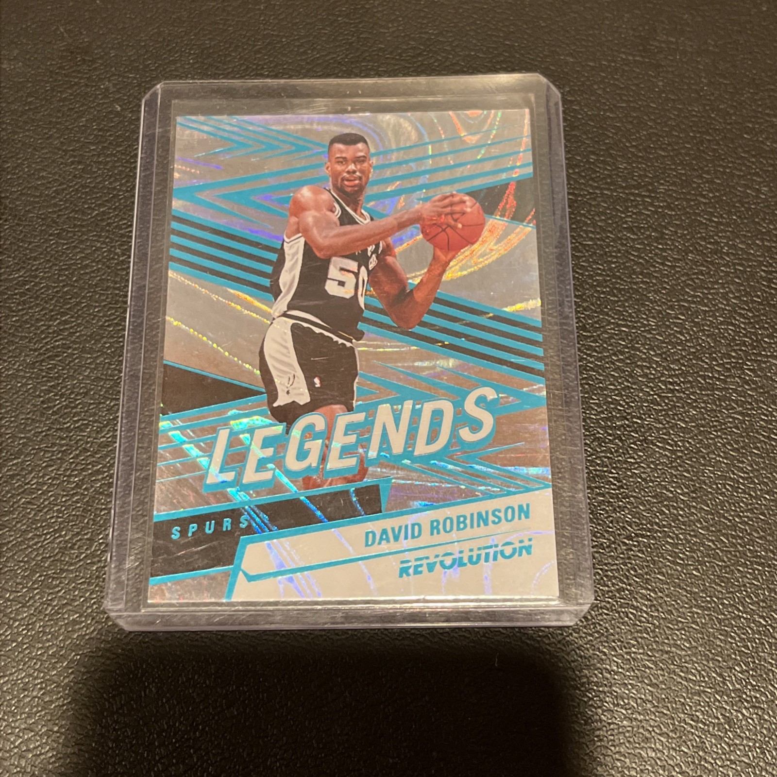Panini Revolution 24-25 Legends David Robinson Teal Swirl /49
