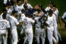 Kirk Gibson Los Angeles Dodgers is mobbed by teammates after Baseball 1988 Photo