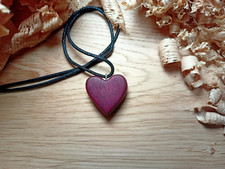 heart pendant made from Bolivian purpleheart, black cord, silver fittings