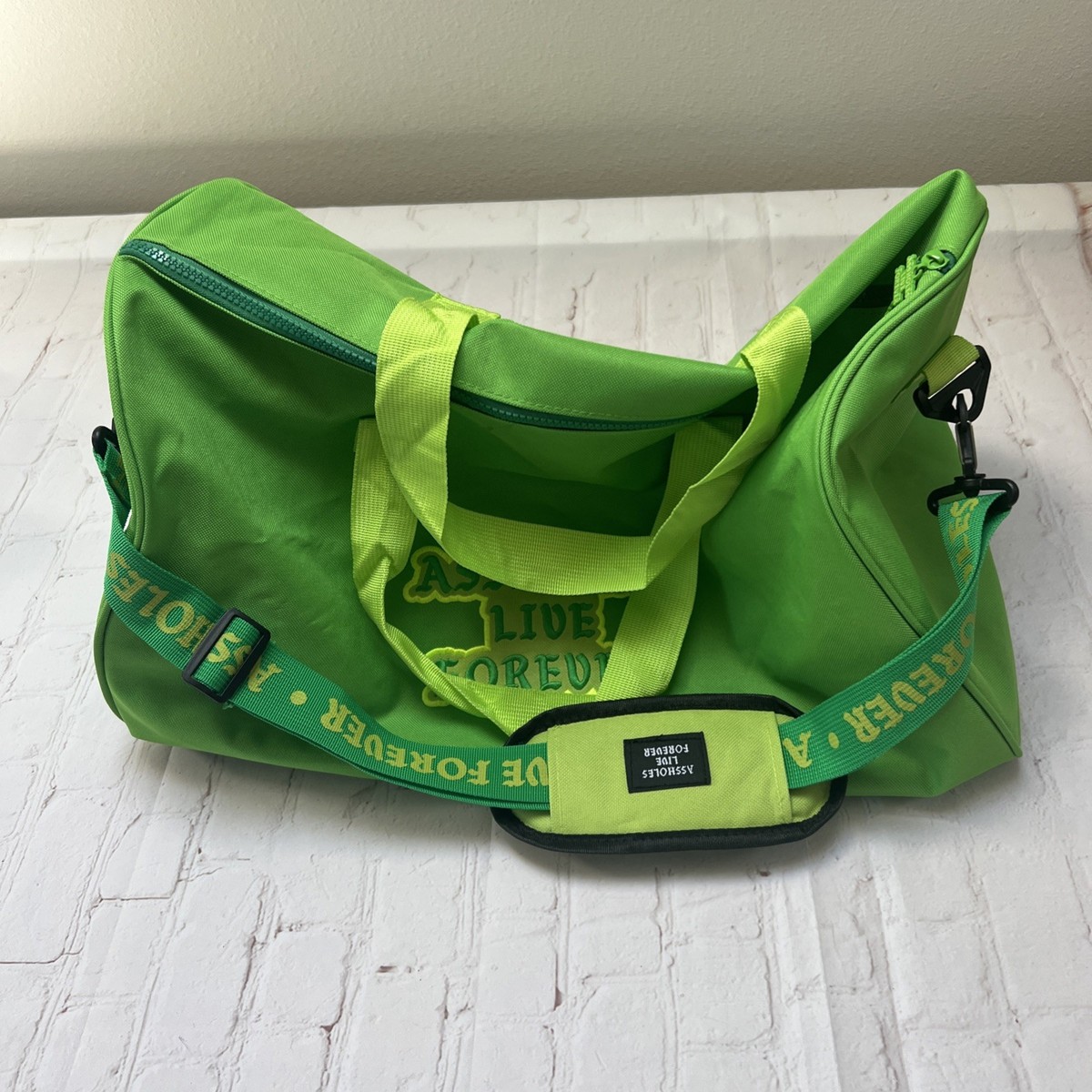 Emotional Baggage Green Duffle Bag A**holes Live Forever EUC  View 4