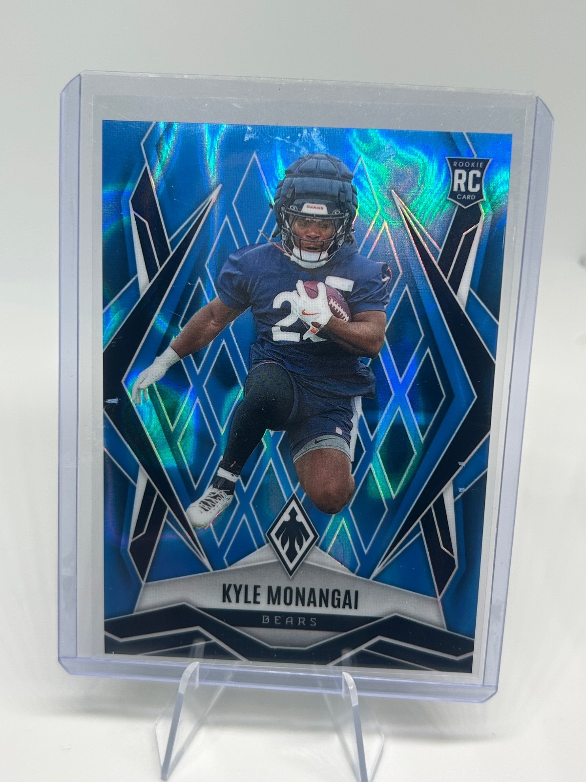 2025 Panini Phoenix - Rookies Kyle Monangai #249 Light Blue Lava /325 (RC)