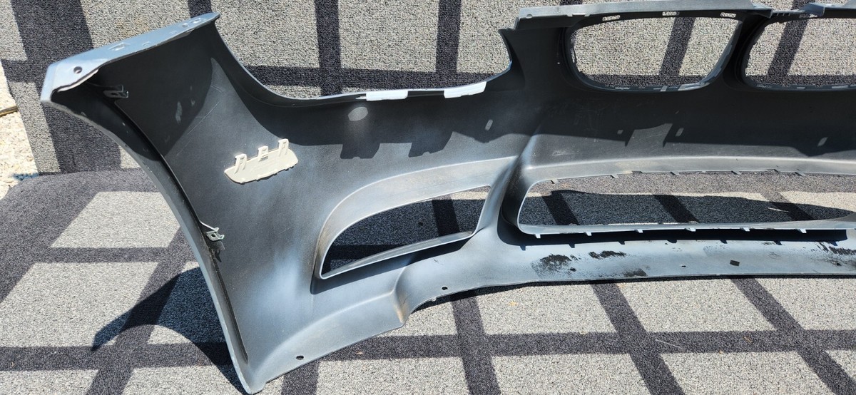 2009 2013 BMW M3 COUPE FRONT BUMPER COVER WASHER HOLES OEM 7899831  