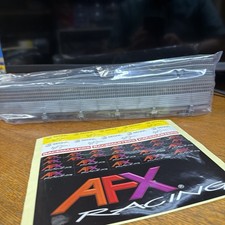 BRAND NEW AFX HO SLOT CAR: 10 PCS. FLEXIBLE CATCH FENCE W/SIGNS AFX22054