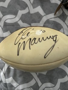 Eli Manning New York  Giants Autographed Football  Obtained in Person at SB XL.