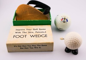 1960s RYDER CUP GOLF BALL & GAG FOOT WEDGE WIND UP WALKING BALL