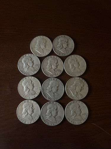 11 Pack Of Franklin US Half dollars 1-1951 3-1952 1-1956 1-1957 2-1958 3-1963