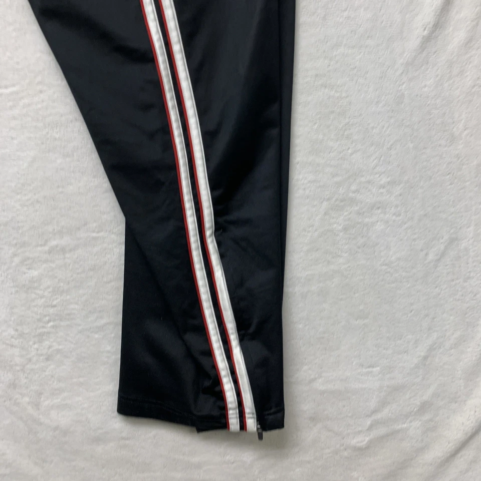 Pantalones deportivos grandes Tek Gear para hombre negros con cremallera al tobillo y cordón a rayas Foto 4 de 4