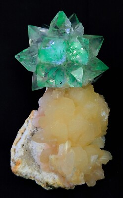 Artificially made Apophyllite crystal flower on Stilbite bows formation mineral
