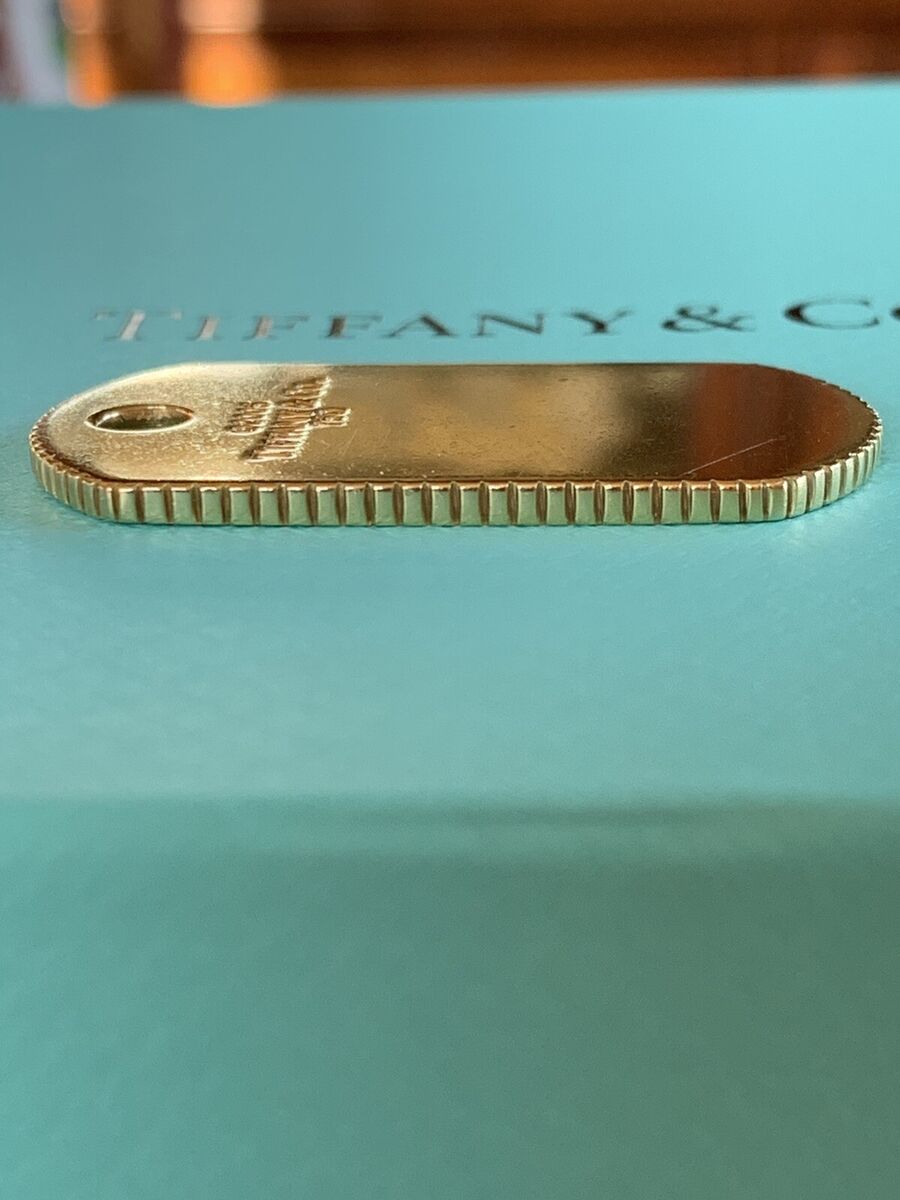 Tiffany & Co 18K Gold Coin Edge Dog ID Tag Pendant Tiffany & Co 18K Gold Coin Edge Dog ID Tag Pendant