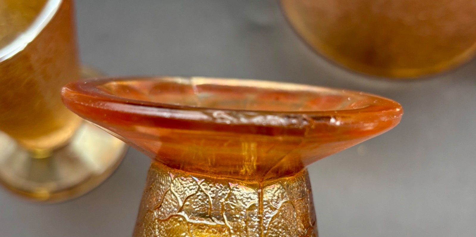 Jeanette Carnival Glass Pitcher and Four Tumblers Marigold