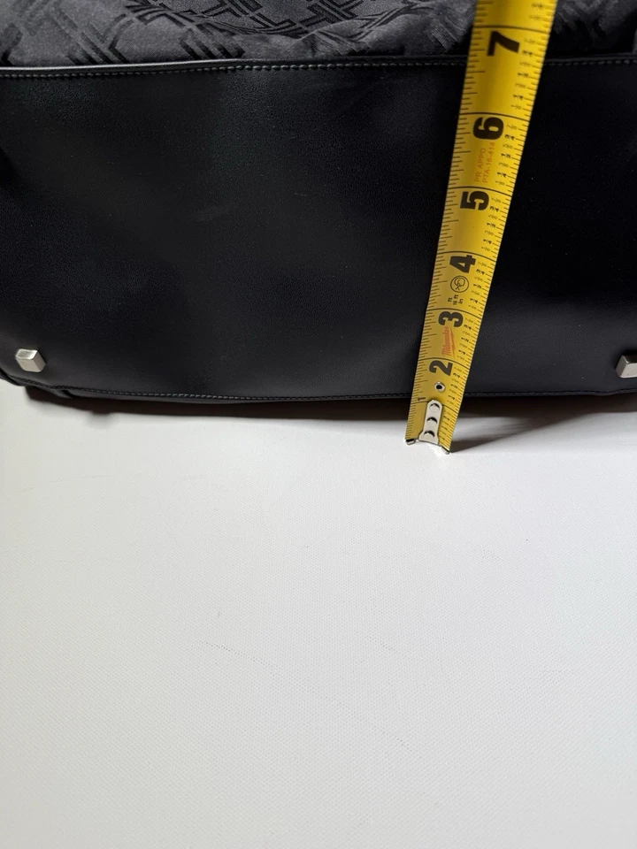 Bolso de hombro Tumi negro con ribete de cuero para computadora portátil Bolso de viaje Trabajo Gimnasio llevar Foto 4 de 4