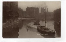 RIVER AIRE, LEEDS: Yorkshire postcard with steamer and barge (C79776)