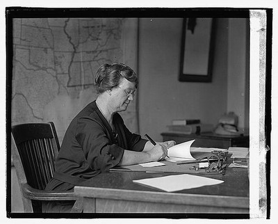 Photo:Mrs. Viola B. Pughn Writing at Desk 1923