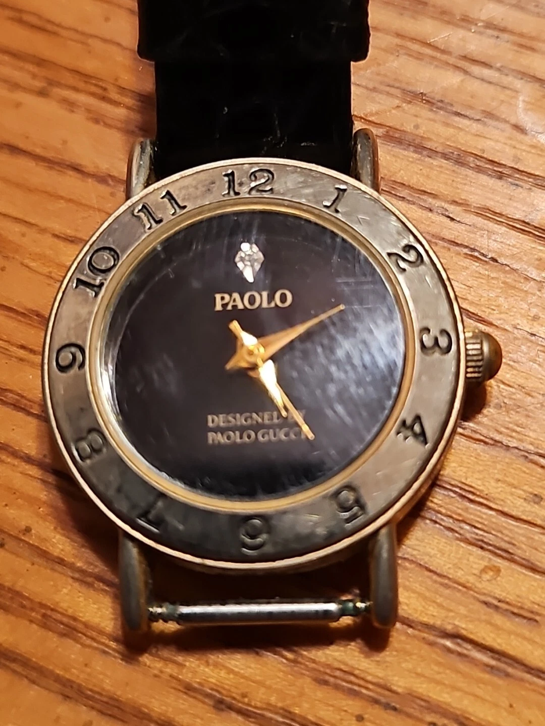 Montre femme vintage Paolo Gucci diamant 24 mm cadran noir ton or W302