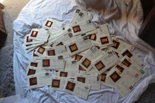 Lot of 73 Golden Replicas of US Stamps, 22kt Gold First Day Issue Mixed Subjects