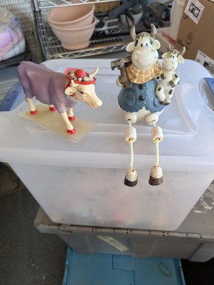 Two Cow Figurines