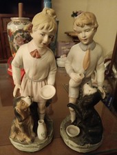 Set Of 2 German Made Porcelain Boy And Girl With Dog V Mark On The Bottom