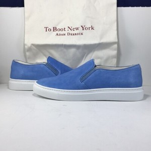 light blue slip on sneakers