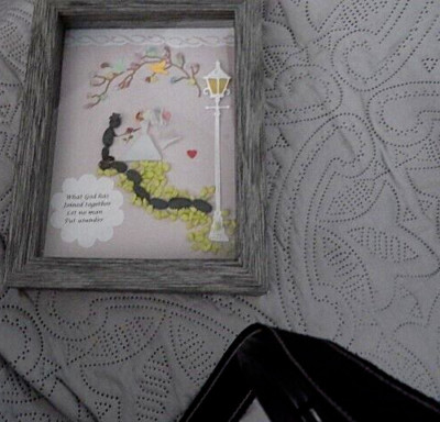 Bride Groom Wedding. Stone &Pebble art Framed. CLOSE-UP of gold tiara in hair