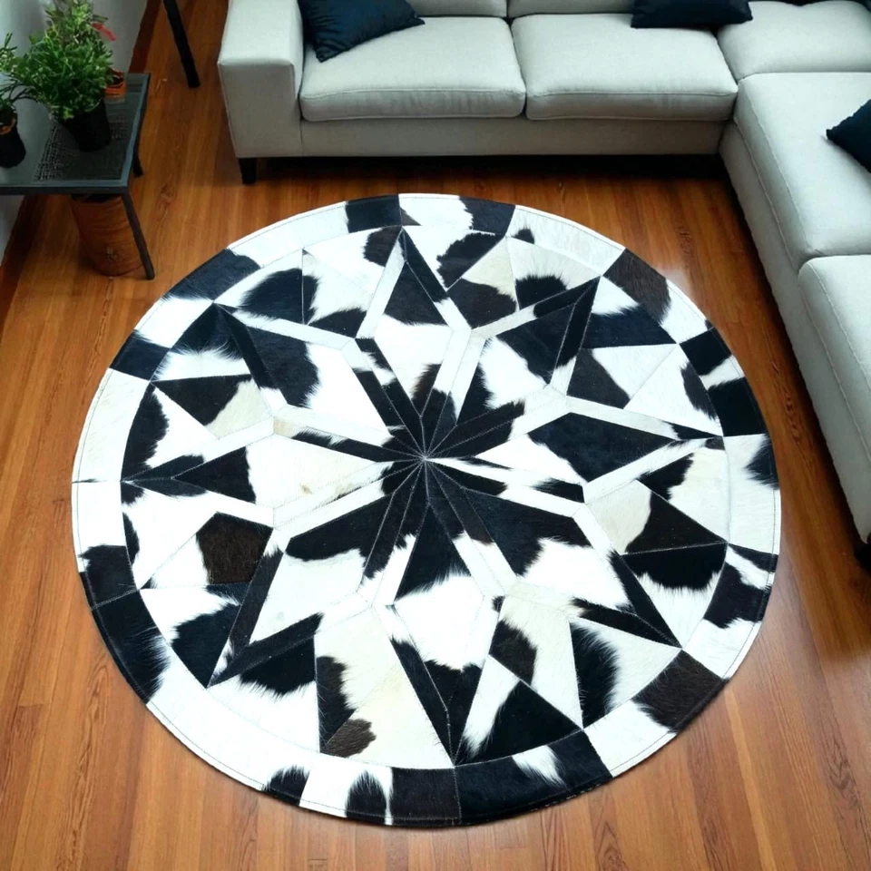 Alfombra redonda de retazos de cuero de vaca blanco y negro de lujo - alfombra moderna de pelo natural sobre piel Foto 3 de 4