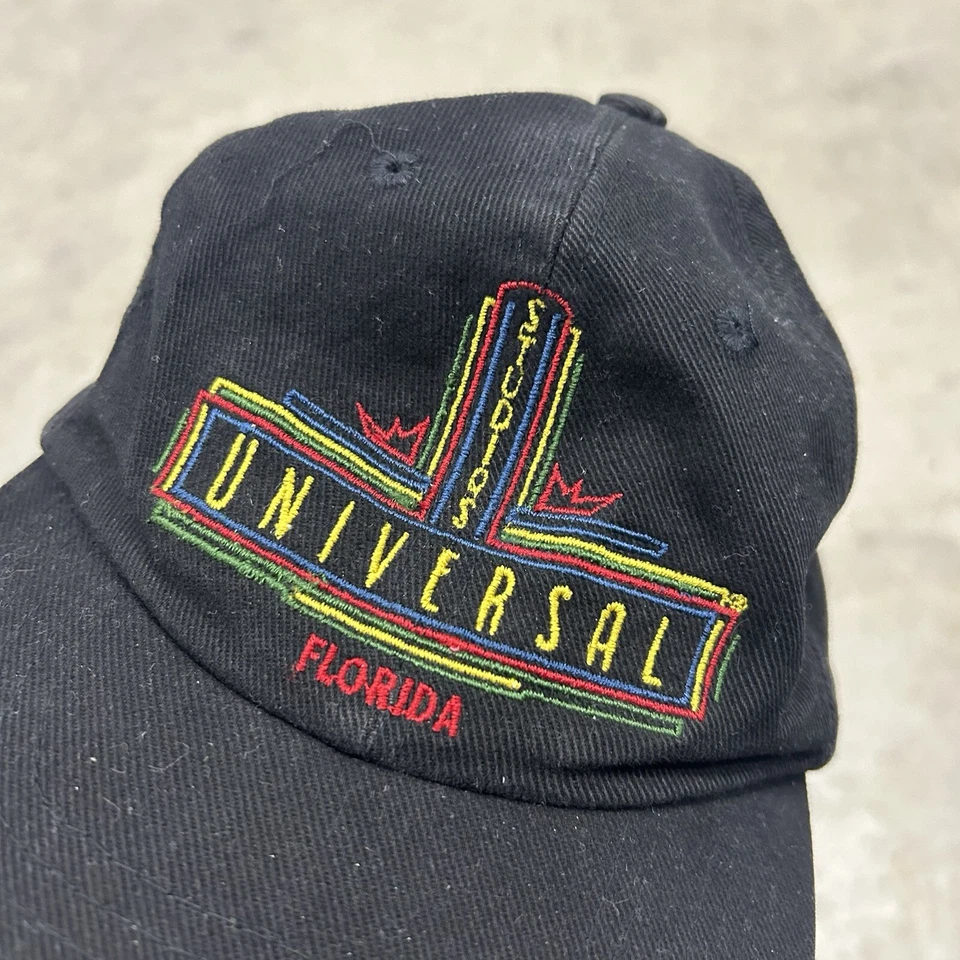DE COLECCIÓN Universal Studios Sombrero Negro Gorra Correa Trasera Parque Temático TV Películas Años 90 Raro Foto 2 de 4
