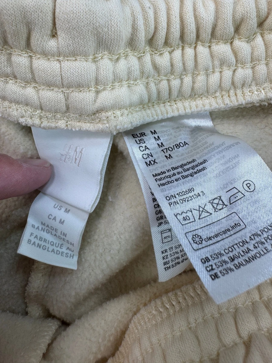 Pantalones deportivos medianos H&M para mujer amarillo claro con cordón elástico