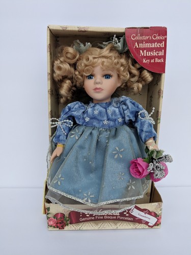 “Collectors Choice” Fine Bisque Porcelain Musical Doll Blue Dress