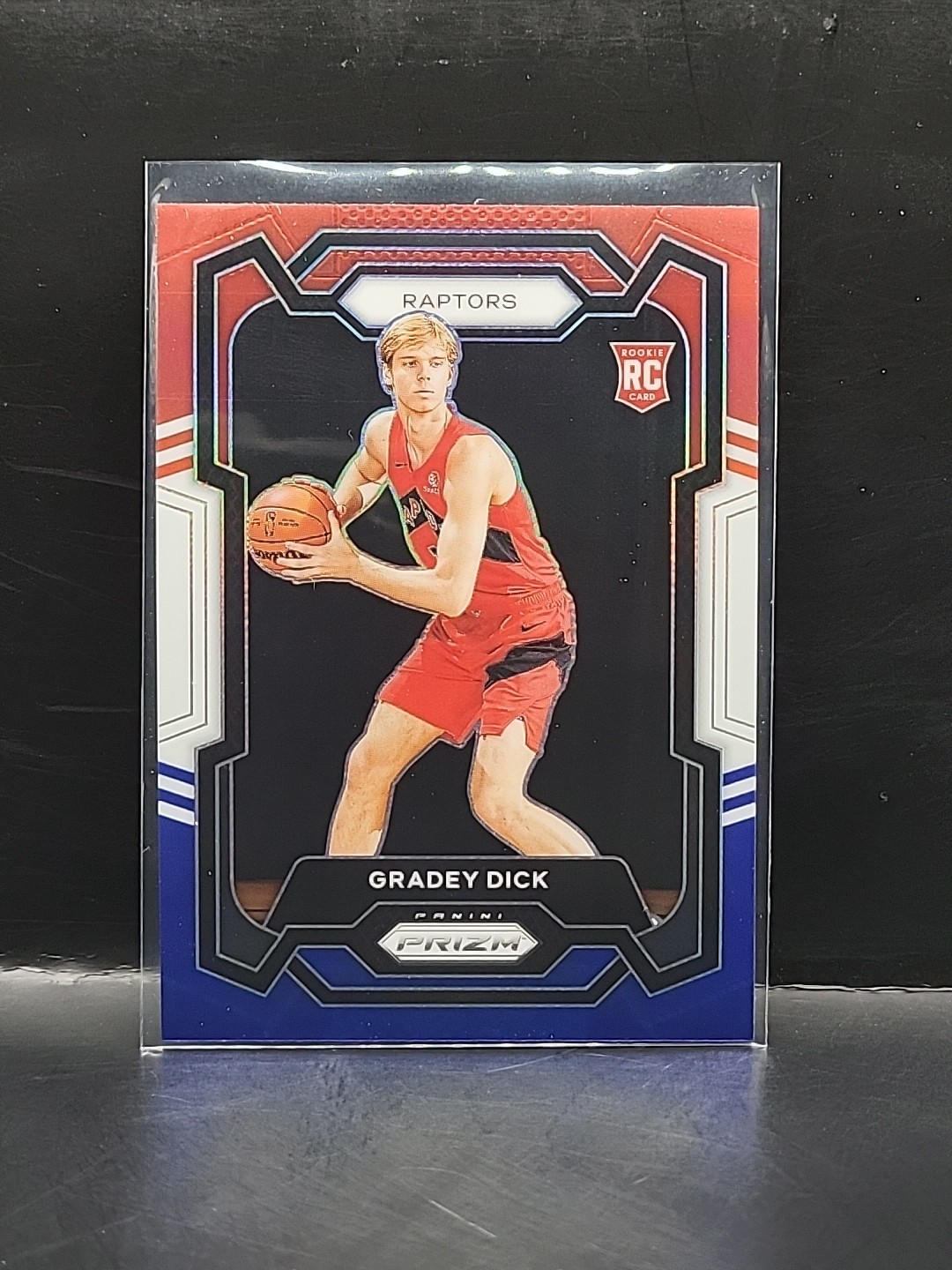 2023-24 Panini Prizm Gradey Dick Red White Blue Rookie Card (RC) #134 Raptors