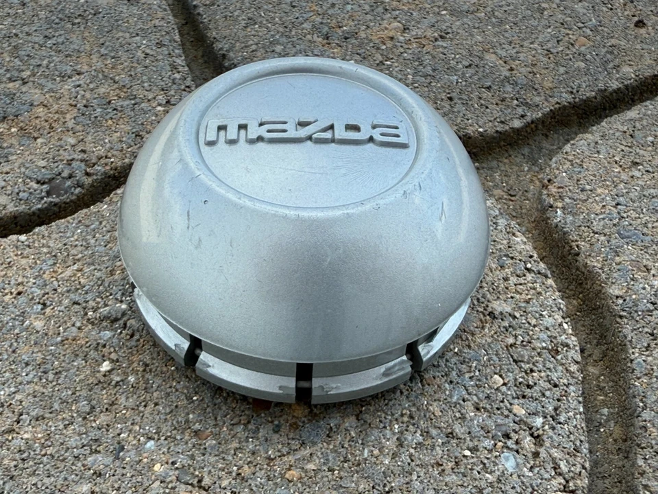 MAZDA B-2300 B-3000 B-4000 OEM TAPA CENTRAL DE RUEDA PLATEADA F57A-1A096-LA 1994-1997 Foto 2 de 3