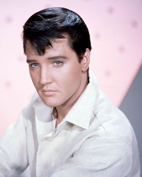 Elvis Presley 1960's in white shirt capturing The King in his