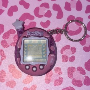 Tamagotchi on Purple | eBay