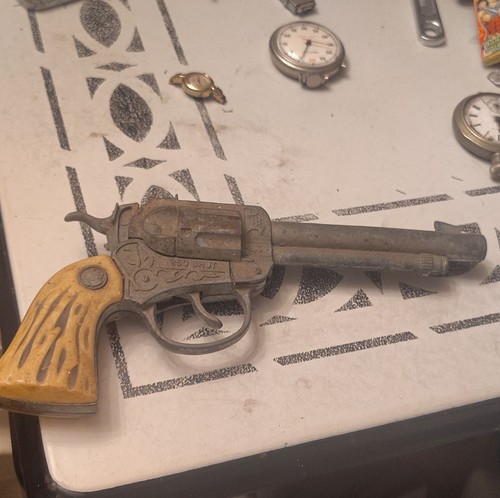 Vintage Cast Iron 250 Shot Western Style Toy Pistol Yellow Handle