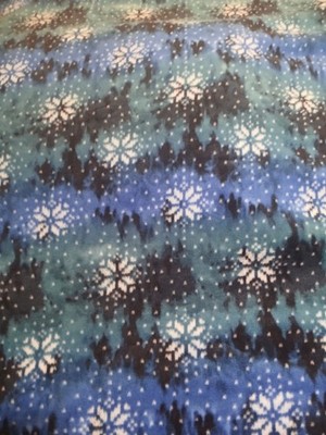Blue snowflakes on fabric