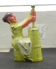 Manoil Woman Churning Butter