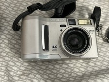 Minolta DIMAGE S414 4.0 MP 4x Zoom Digital Camera + Bag, Memory, Battery Charger