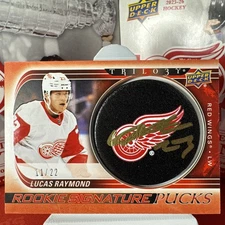 2022-23 Upper Deck Trilogy Rookie Signature Pucks Lucas Raymond AUTO /22 On Card