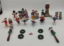 19 Piece Mixed Lot of Christmas Village Figures and Parts - Ice Skating