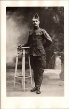 RPPC WWI Soldier in Uniform Studio Portrait AZO Stamp Box c1910s