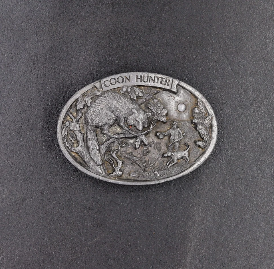 Hebilla de cinturón de metal vintage 1986 C+J 1137 "Coon Hunter" - Hecho en EE. UU. Foto 2 de 3