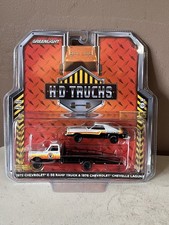 GREENLIGHT COLLECTIBLES 1:64 Scale 1972 Chevy C-30 Ramp Truck & 1976 Chevelle