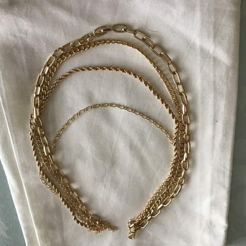 gold coloured chain necklace, approximately 16 inches long.