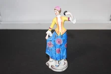 Vintage unmarked figurine, Woman in blue and yellow dress, Dresden style? 