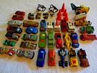 Thirty-three vintage 1:64 scale various brands well-loved toy cars 1973-1993.