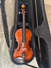 Violin with case and bow, full size.