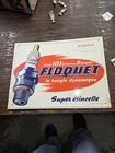 New ListingVintage floquet  Tin Spark plug Embossed