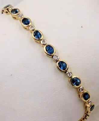 Women Tennis Bracelet 14K Yellow Gold Plated Oval Cut Lab Created Blue Sapphire