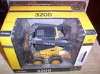 ERTL JOHN DEERE 320D SKIDSTEER - NIB — photo 2