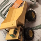 Tonka Yellow Pressed Steel Dump Truck Black Construction Vehicle