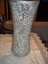 flower vases one silver and one glass