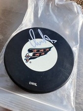 ALEXANDER OVECHKIN AUTOGRAPHED PUCK -  AUTHENTIC HOLOGRAPHIC STICKER